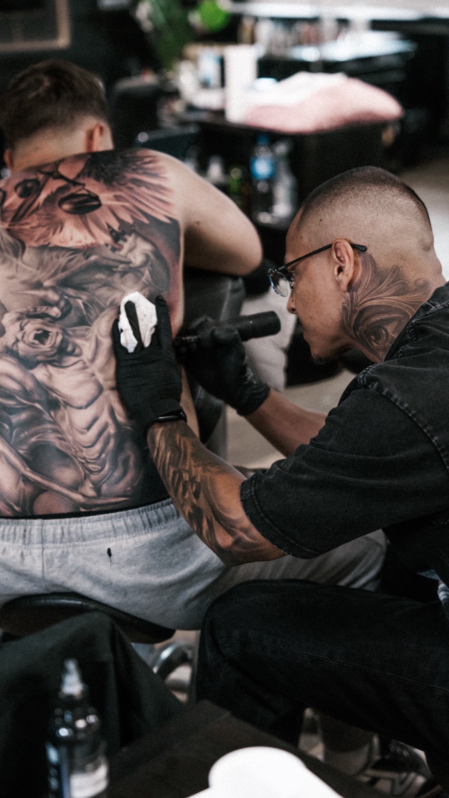 Aldo tattooing a custom back piece