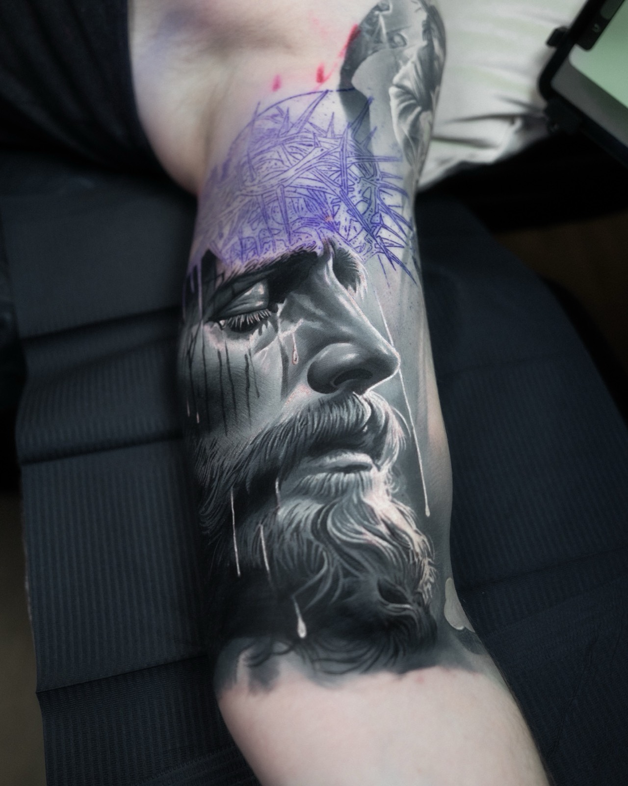 Black and grey portrait of Christ wearing the crown of thorns