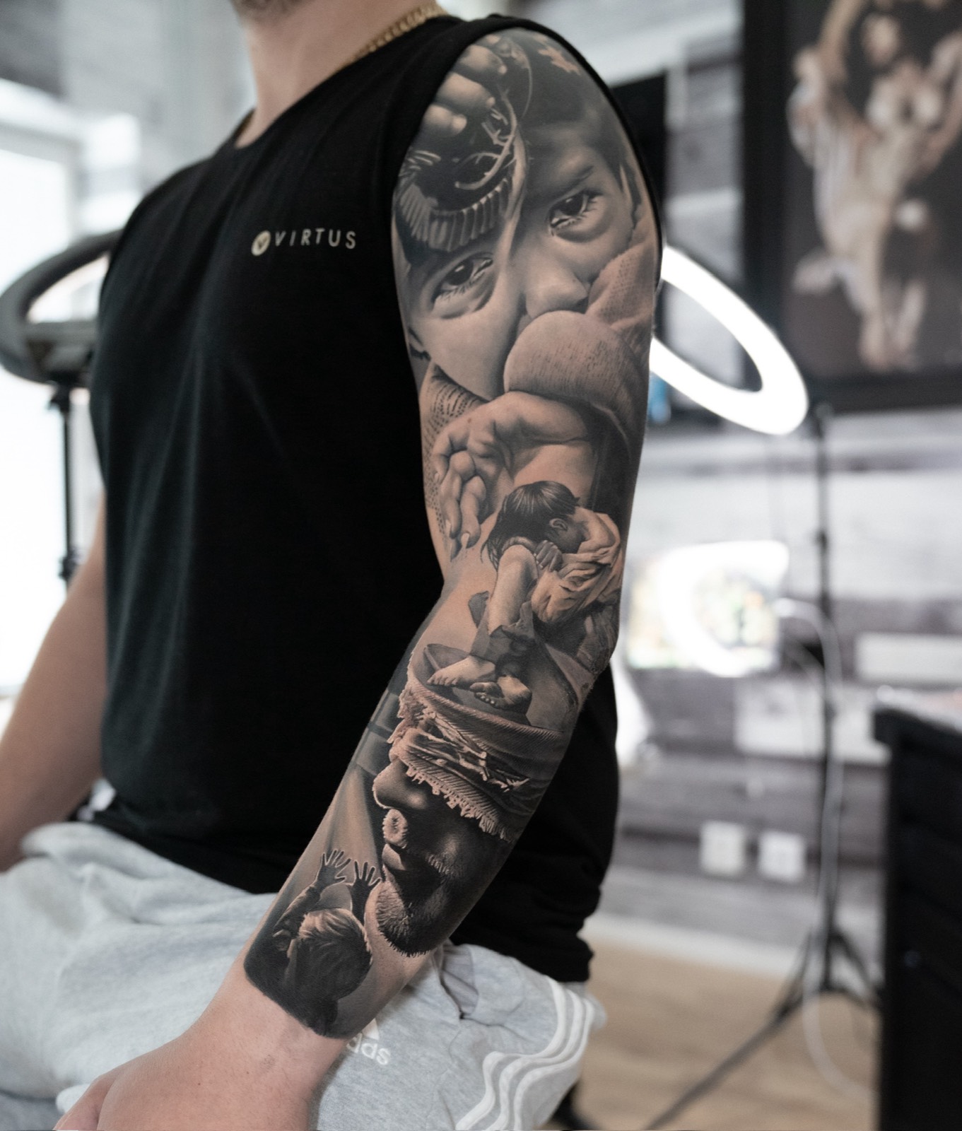 Black and grey family narrative sleeve with layered portraits