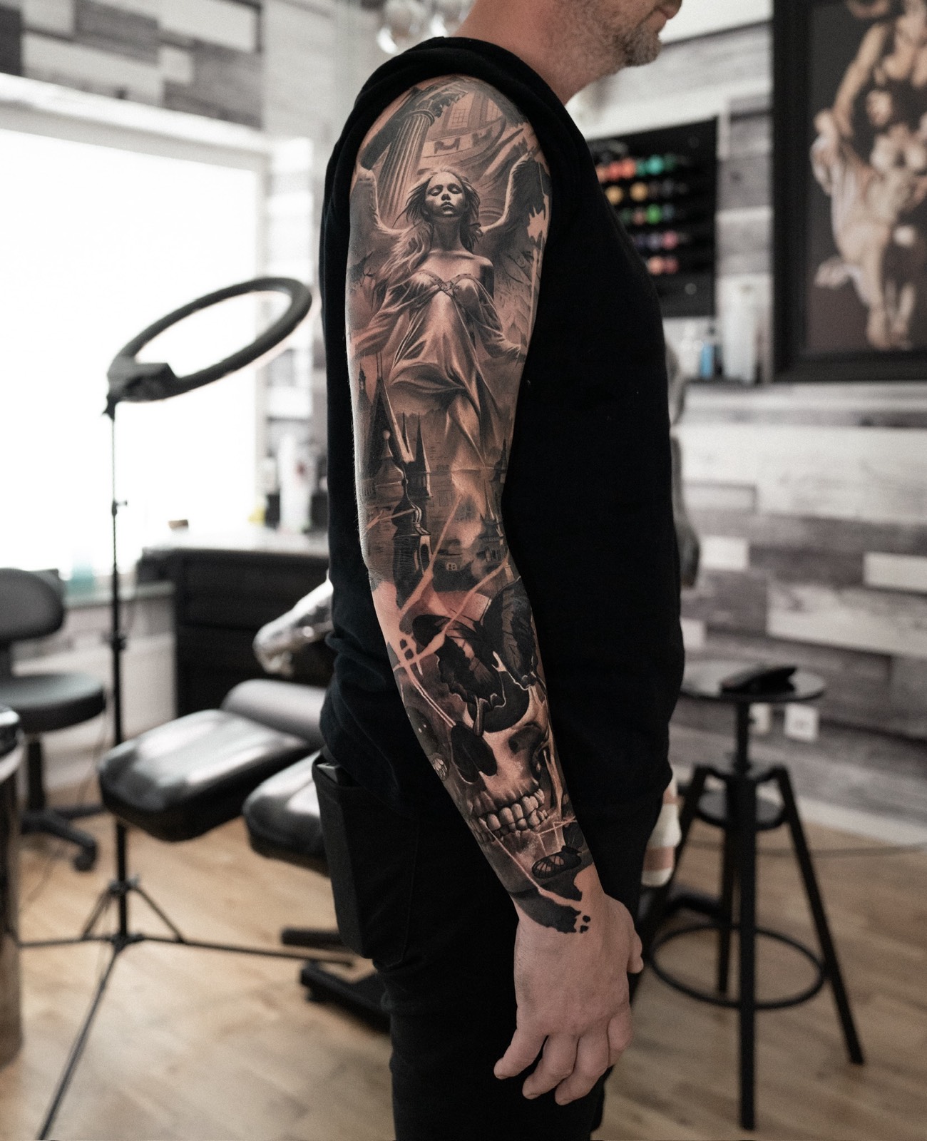 Black and grey sleeve with an angelic figure and skull