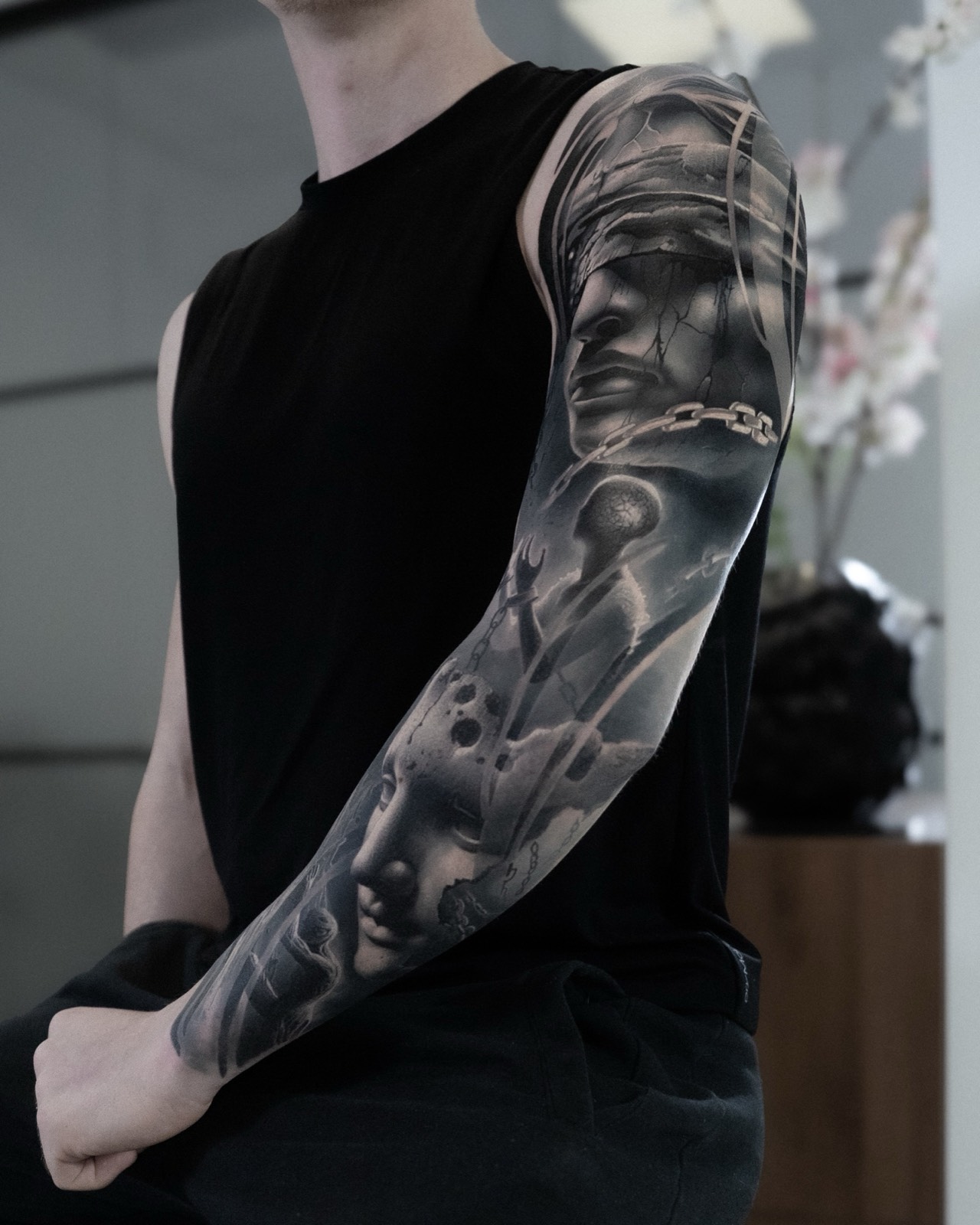 Black and grey full sleeve with a veiled figure and surreal details