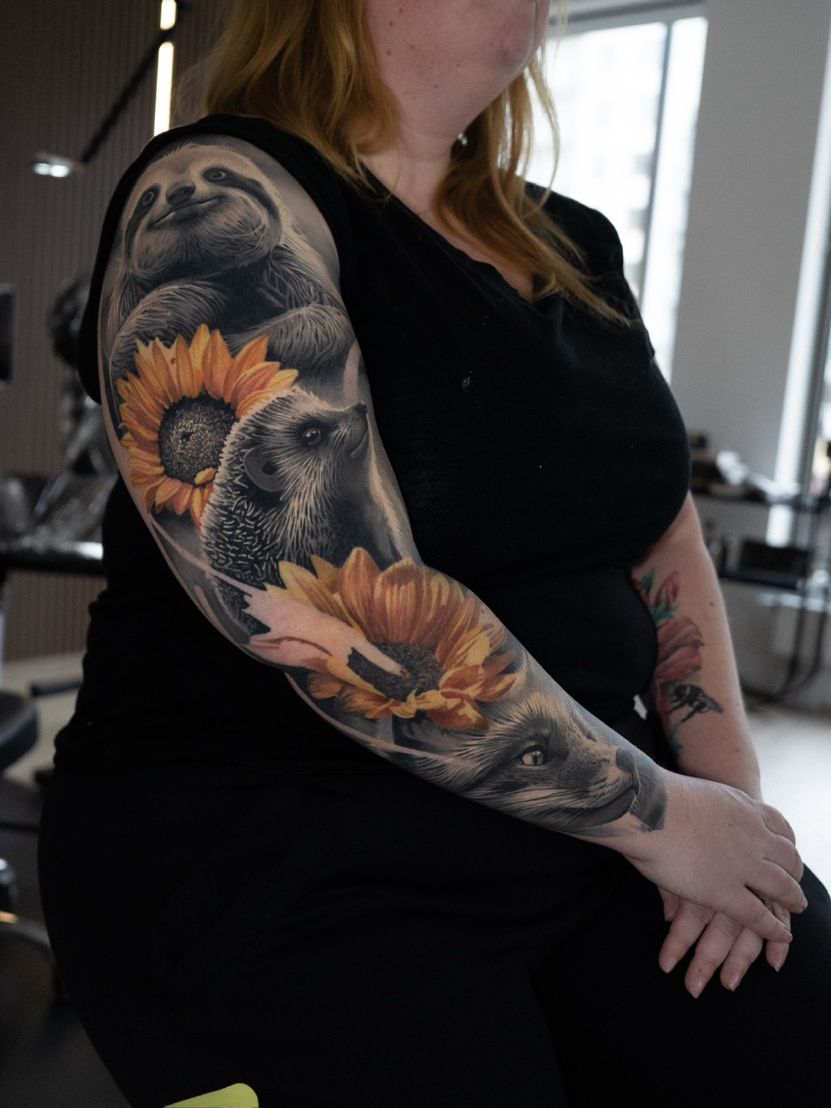 Animal sleeve with a sloth, hedgehog, fox and warm sunflower accents